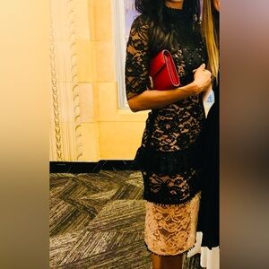 Elegant black and beige lace dress